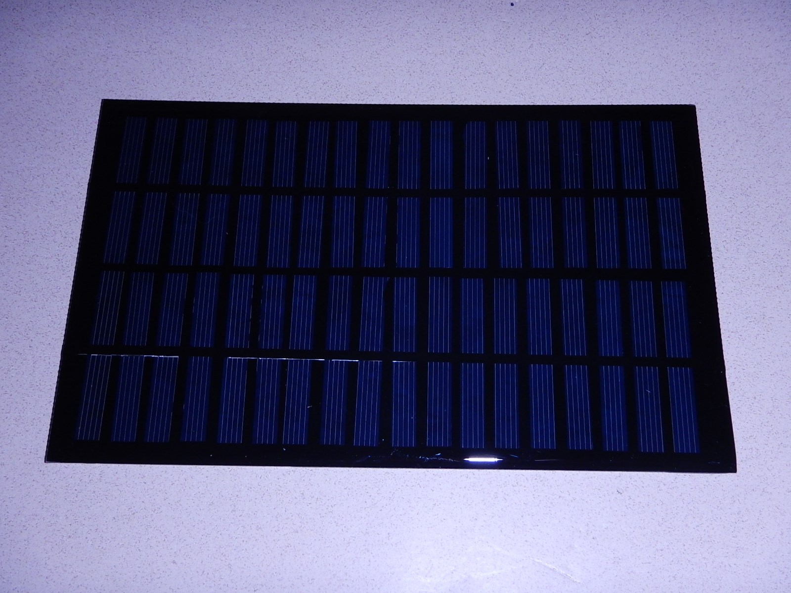 18 volt x 138 mA. Mini Solar Panel epoxy virtually indestructible