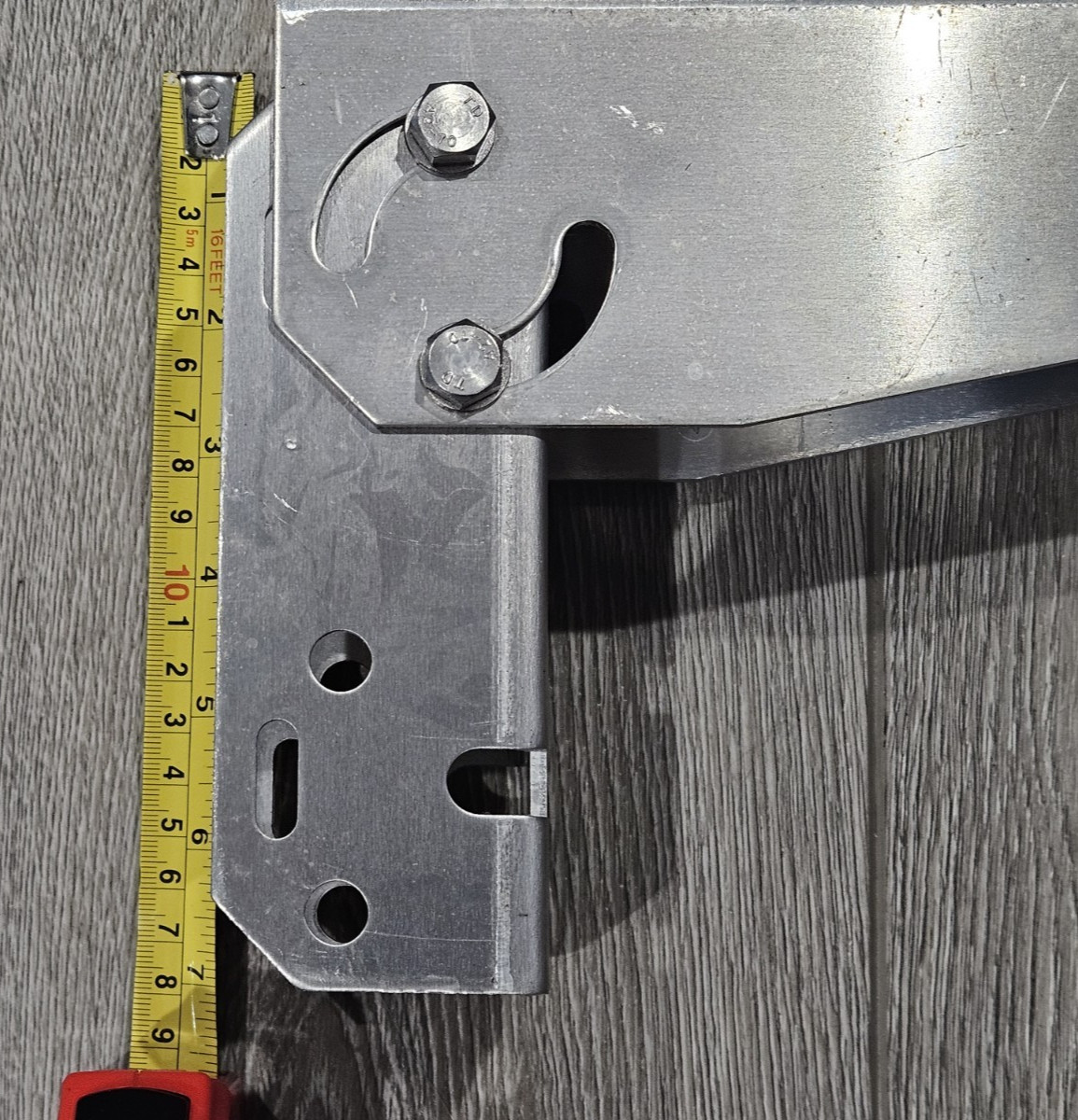 Adjustable angle bracket for pole mounting a small solar panel