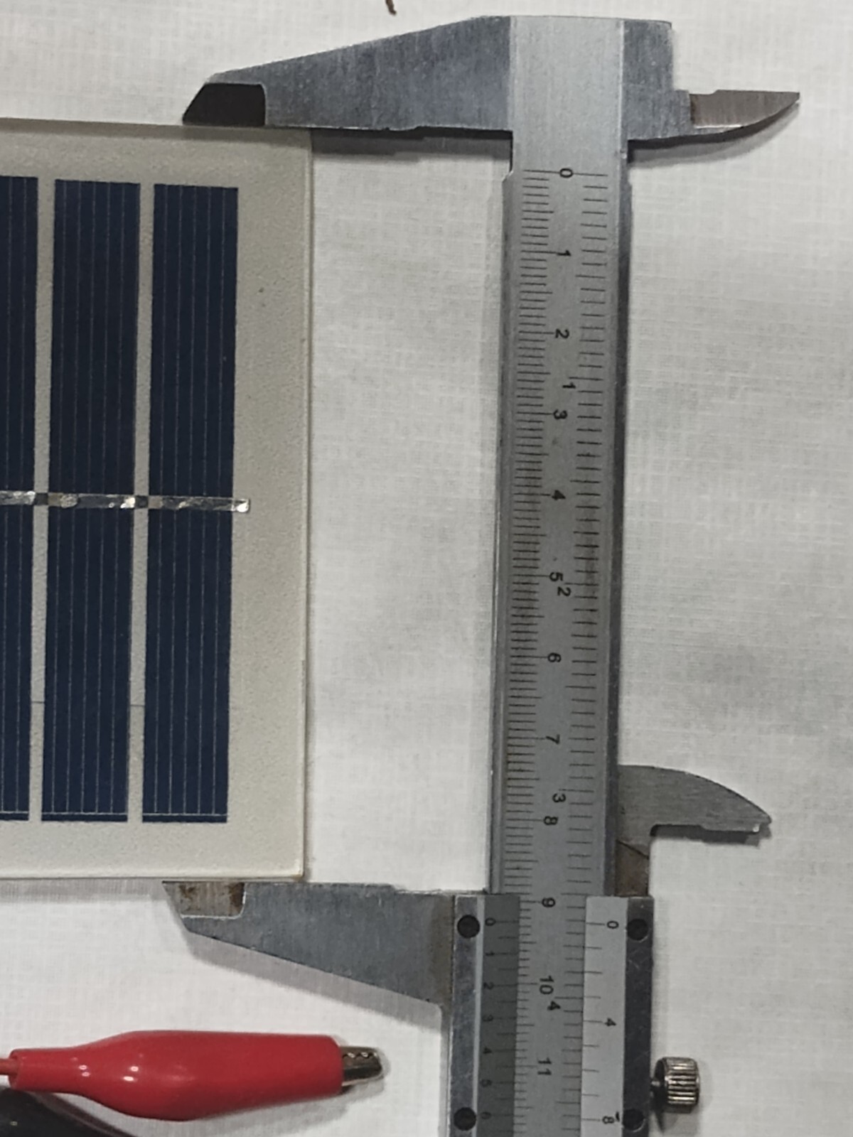 two small 6v solar panels with alligator clips glass