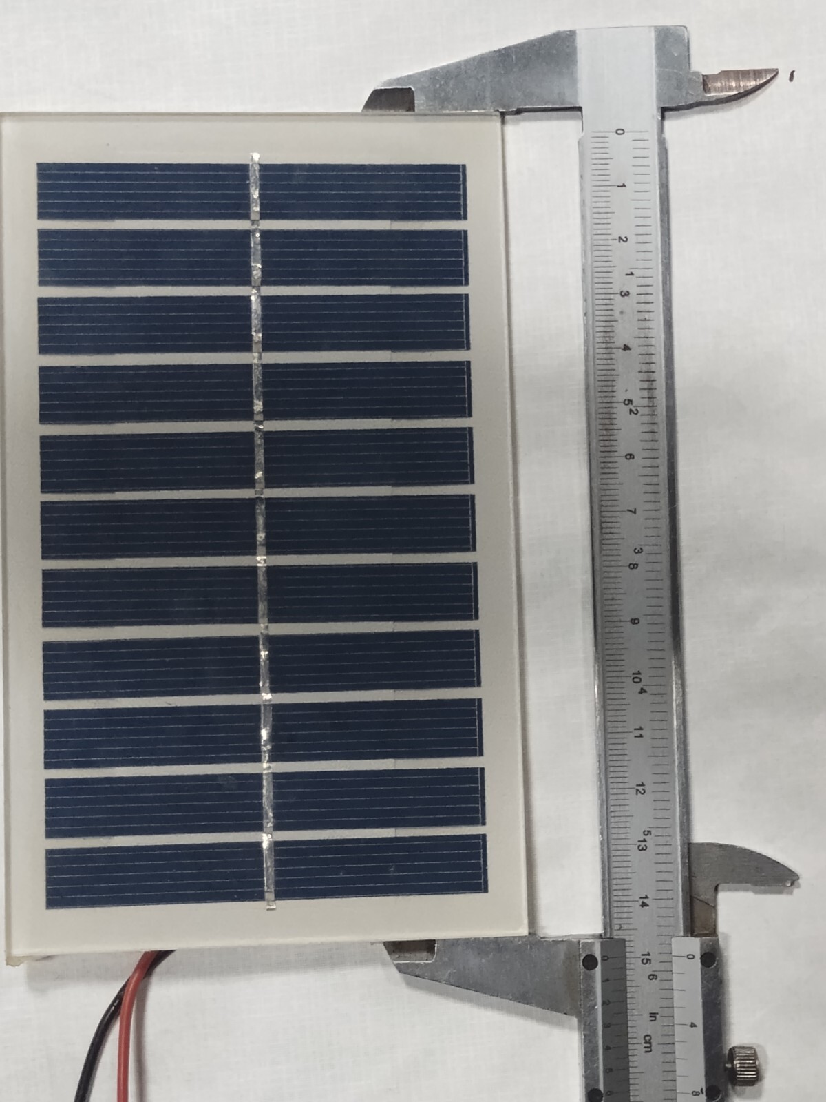 two small 6v solar panels with alligator clips glass
