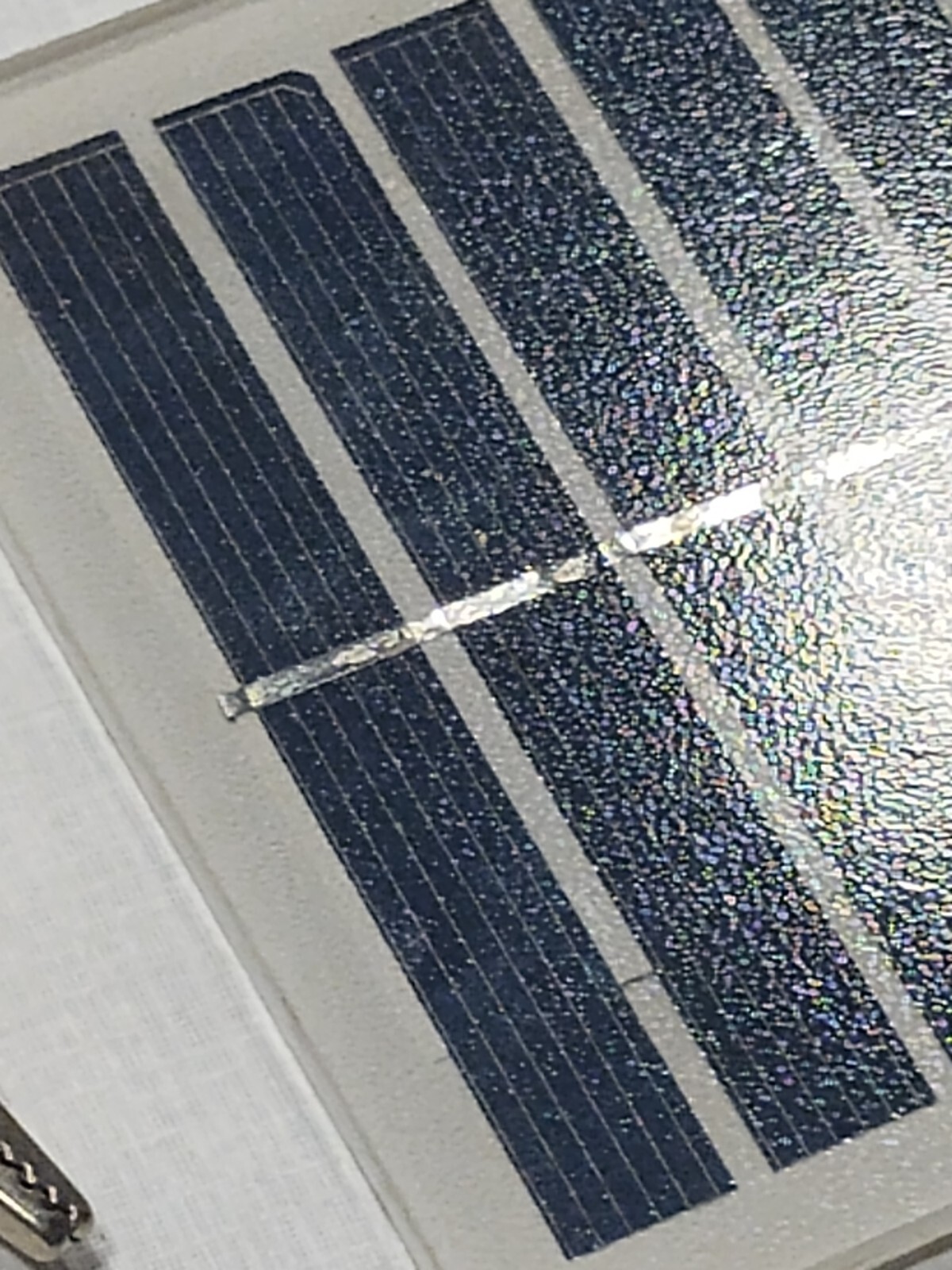 two small 6v solar panels with alligator clips glass