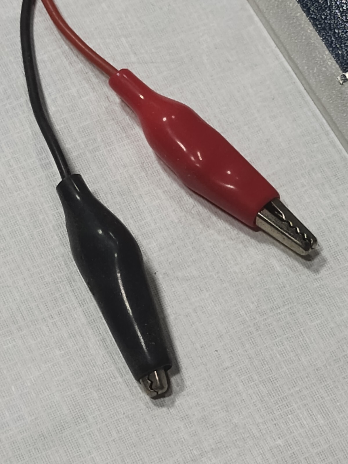 two small 6v solar panels with alligator clips glass