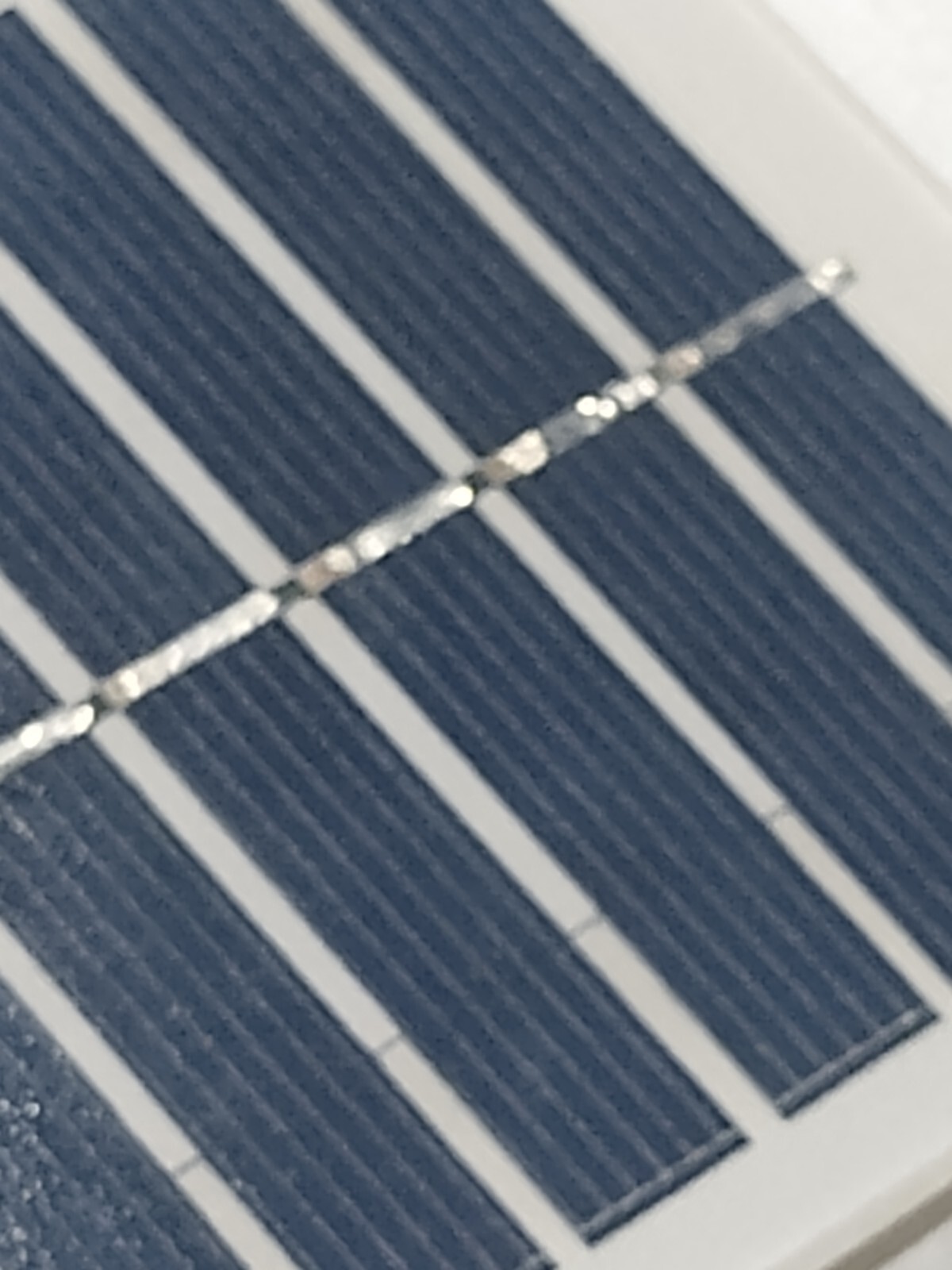 two small 6v solar panels with alligator clips glass